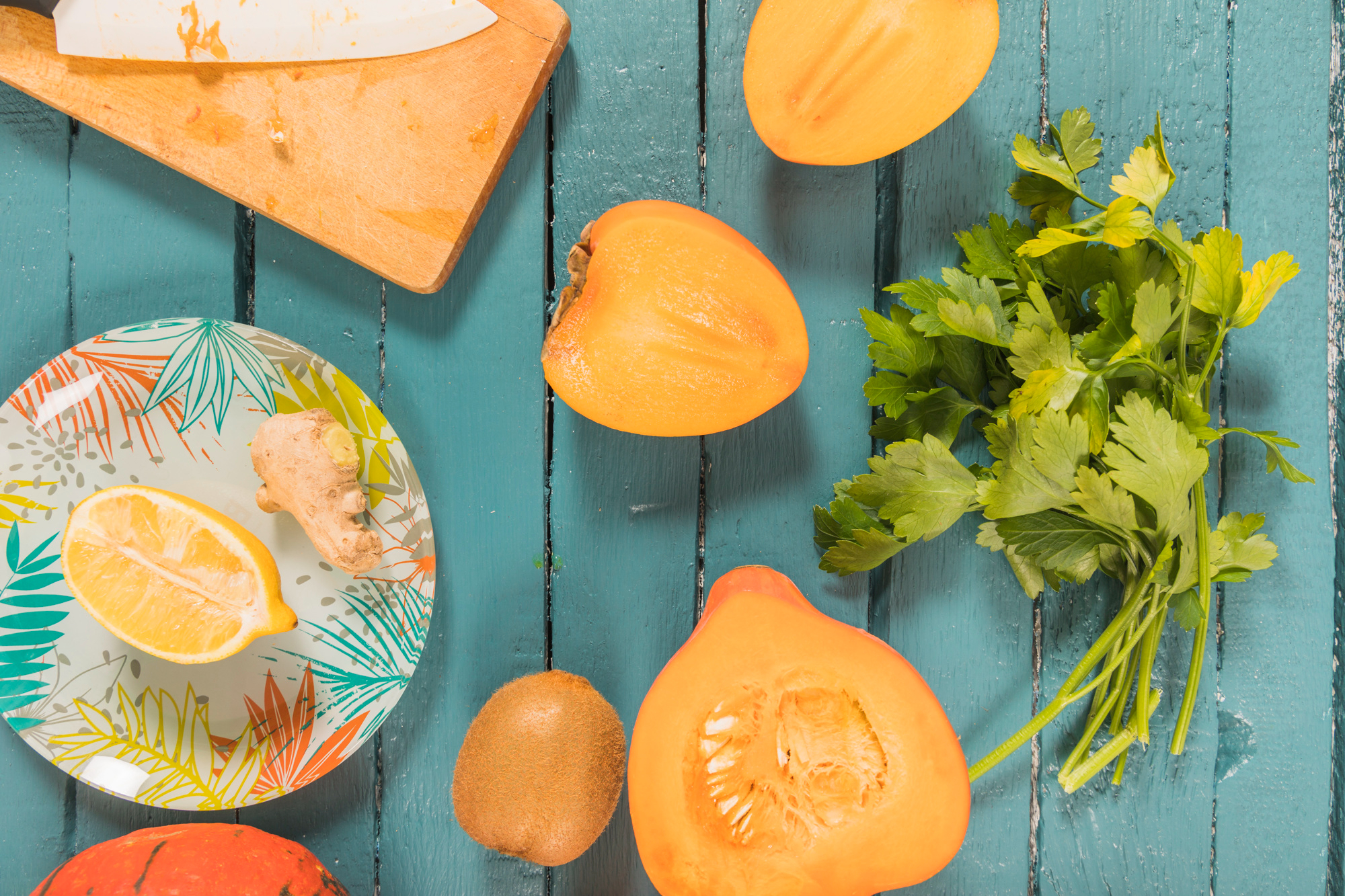 Seasonal British fruits and vegetables arranged on a light table